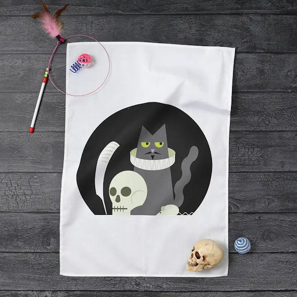 Tea Towel Collection - Shakespeare's Cat with a skull on grey wooden background
