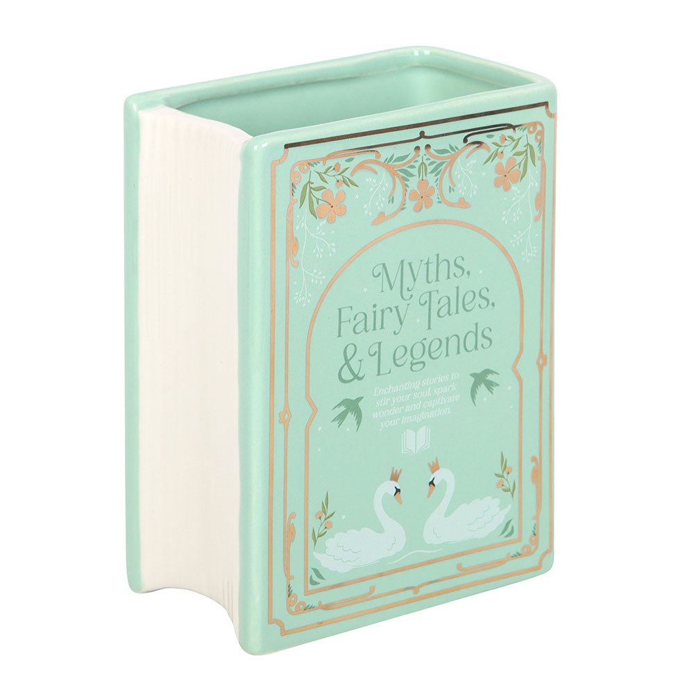 Mint green book-shaped container with 'Myths, Fairy Tales & Legends' text and swan illustration on a white background
