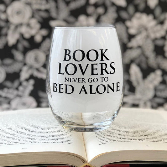 Book Lovers Never Go to Bed Alone Stemless Wine Glass from Fly Paper Products