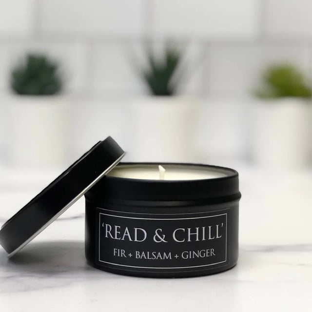 Read & chill soy candle in black tin.