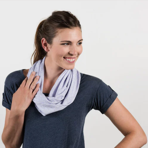 Lady wearing an infinity scarf by litographs featuring words from a classic book