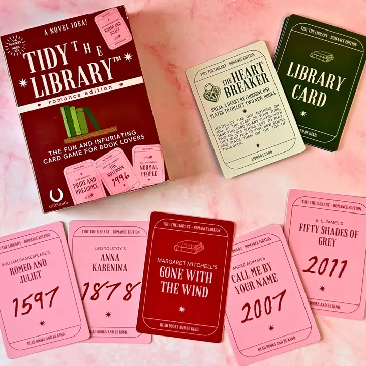 Fun & Games - Tidy the Library Romance Edition Card Game on a pink surface
