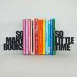 Stack of books with colourful spines on a white background, flanked by black  bookends cutout text 'SO MANY BOOKS' and 'SO LITTLE TIME'.