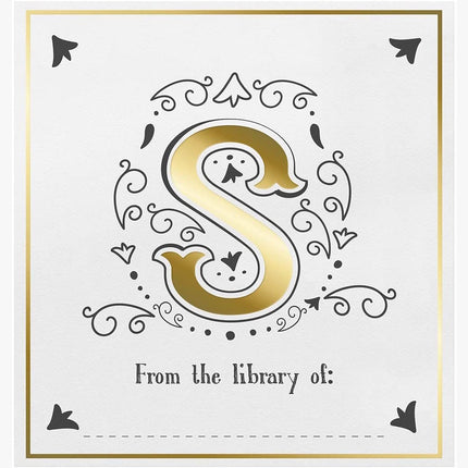 Decorative bookplate with a gold letter 'S' and black decorative elements on a white background.