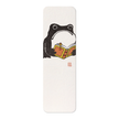 A long, narrow cream-colored rectangular item with rounded corners, featuring a black cartoon frog holding an open yellow-orange book. A small red seal mark appears near the lower right of the illustration.
