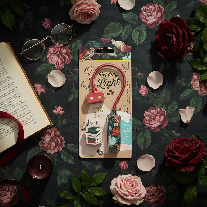 Reading light with floral design packaging on a white background