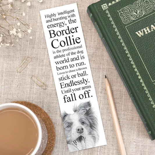 Bookmark with Border Collie text and image on a table with a book and cup of coffee.