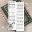 Book with text and a bulldog illustration on a textured surface