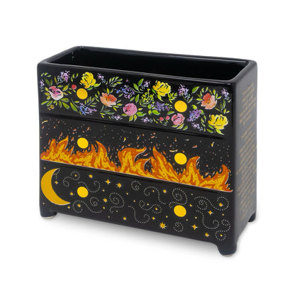 Black vase with floral and fiery designs on a white background