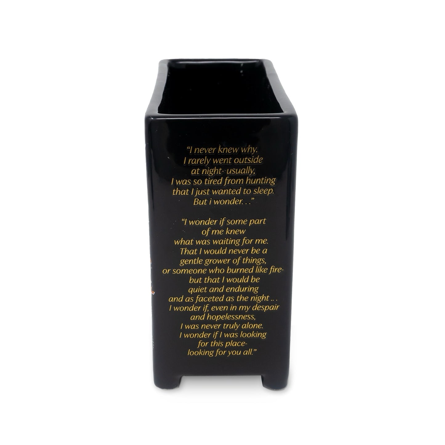 Black vase with yellow text on a white background