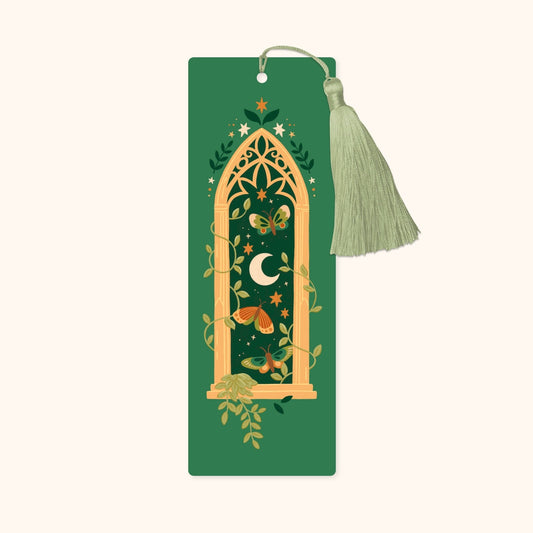 Decorative bookmark with tassel on a green background