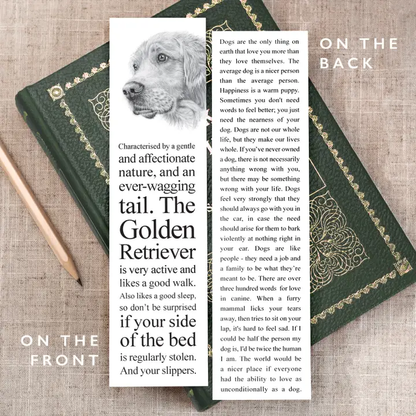 Book with a bookmark featuring a dog illustration and text on a textured surface