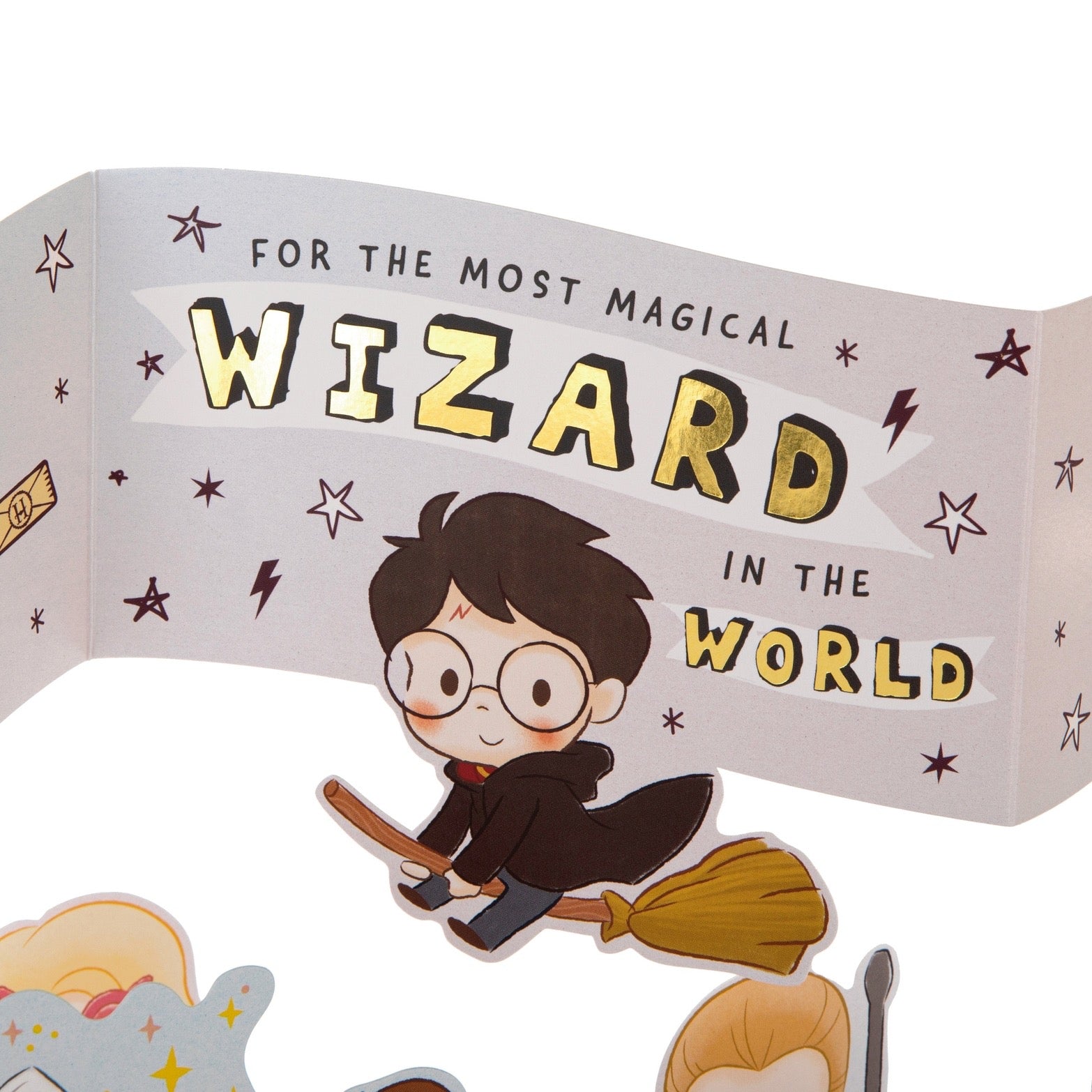 Cartoon character on a broomstick with text 'For the most magical wizard in the world' on a white background
