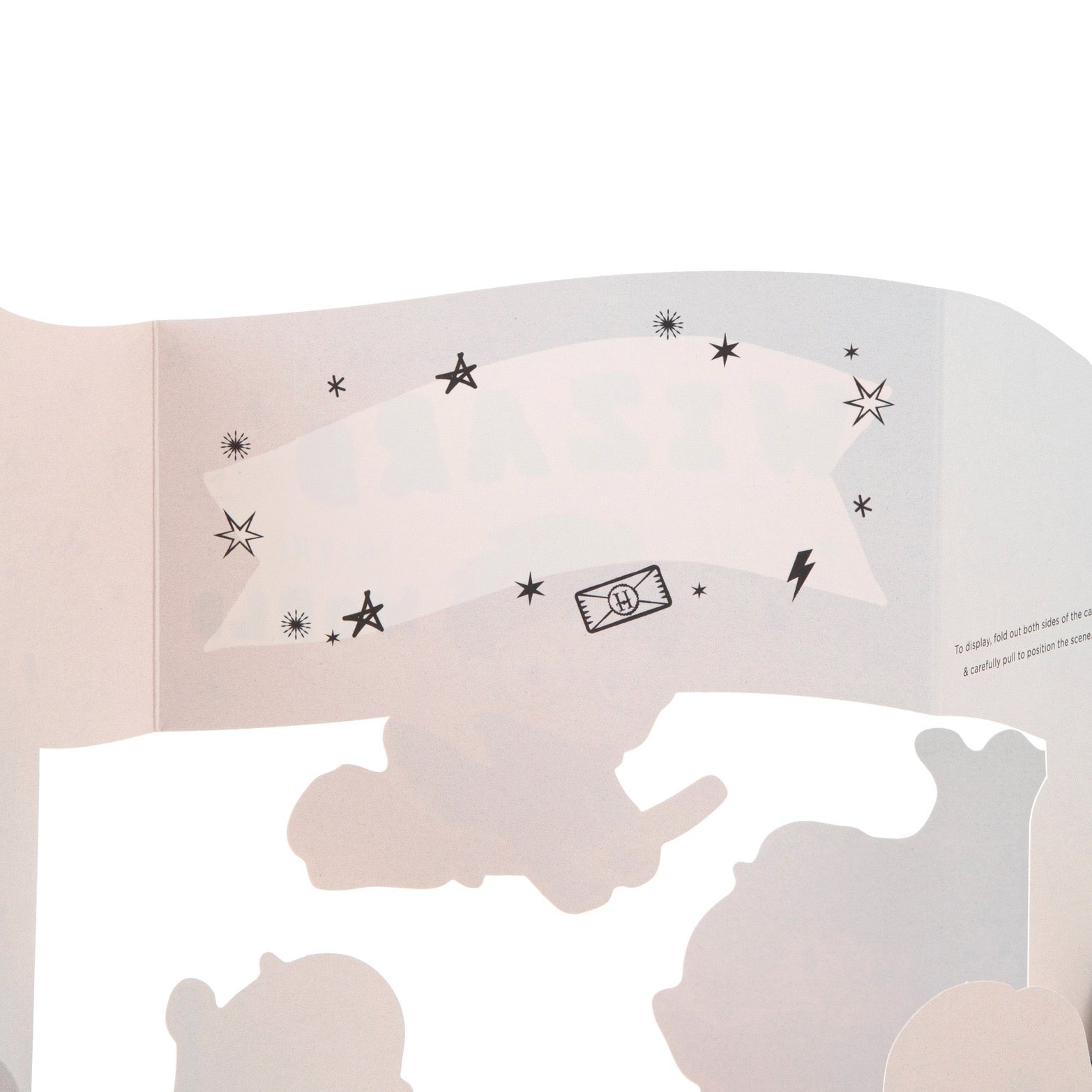 Inside card with black star and moon designs on a white background