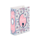 Vase with floral design and silhouette of a woman on a white background