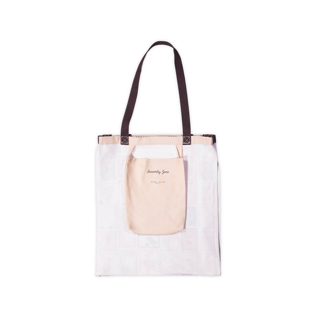 A white canvas tote bag with dark brown shoulder straps and a beige front pocket featuring the text 'lately fun'.