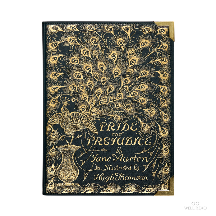 A hardcover book of 'Pride and Prejudice' featuring an ornate gold peacock illustration and lettering on a dark navy blue cover, with gold corner protectors, shown against a plain white background.