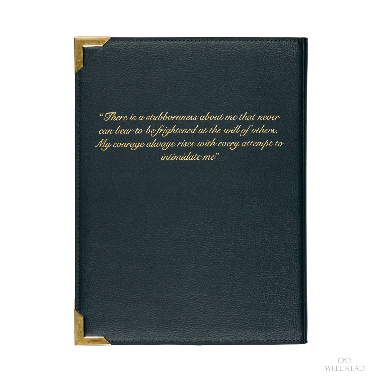 A dark navy blue faux-leather journal with gold metal corner protectors and gold-foiled text on the front cover, shown against a plain white background.
