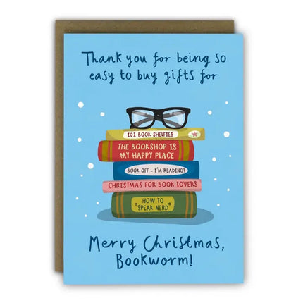 Greeting card with books and glasses illustration on a blue background