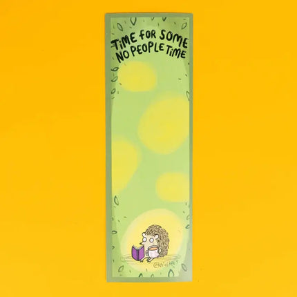 Bookmark with hedgehog reading a book and text 'Time for some no people time' on a yellow background