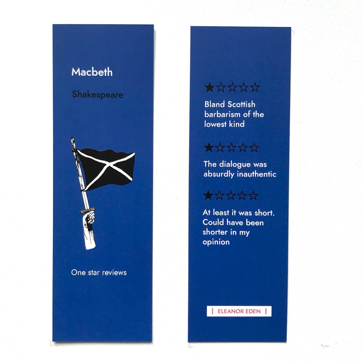 Two blue bookmarks with text and a flag illustration on a white background