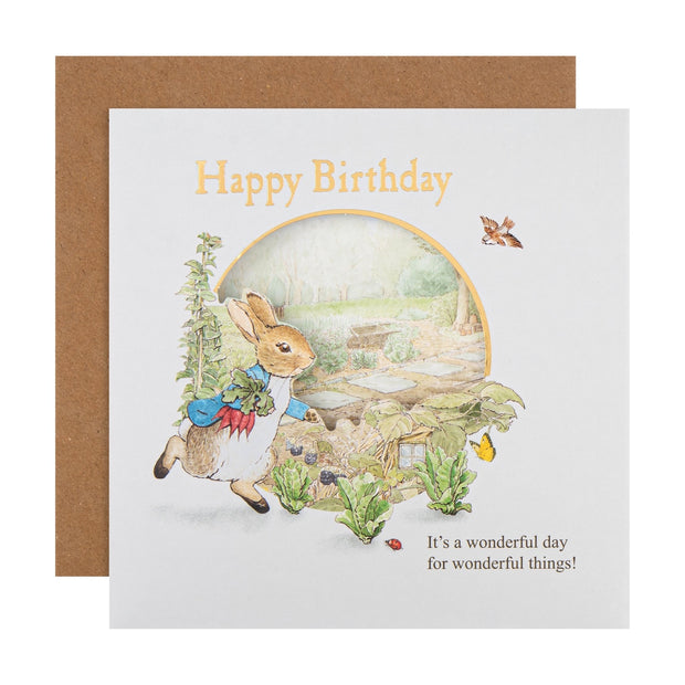 Birthday card with a rabbit illustration and 'Happy Birthday' text on a white background.