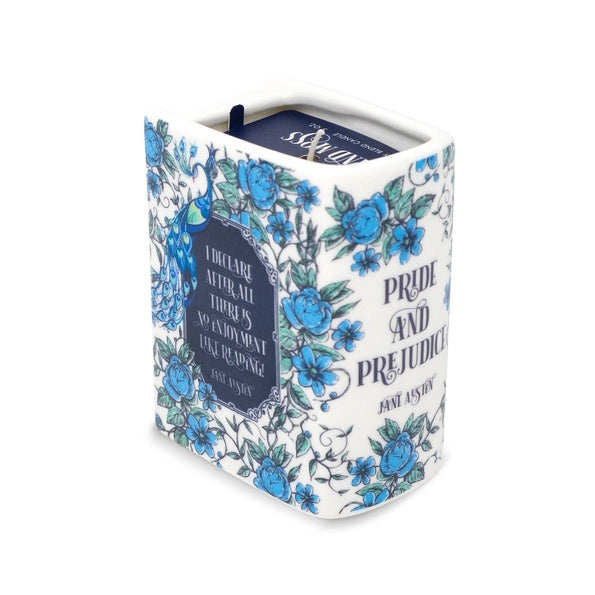 Floral-patterned book-shaped candle  with 'Pride and Prejudice' by Jane Austen on a white background