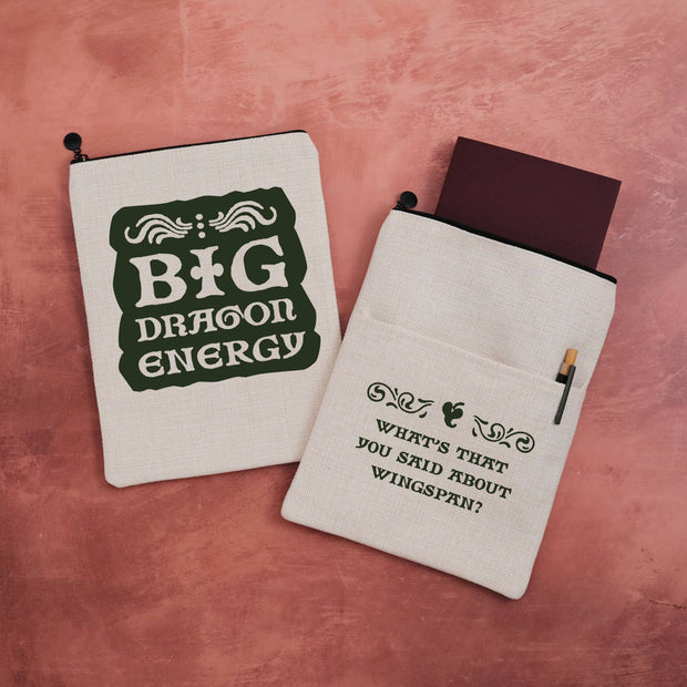 Two pouches with printed text on a pink background