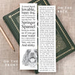 Book with text and a dog illustration on a textured surface