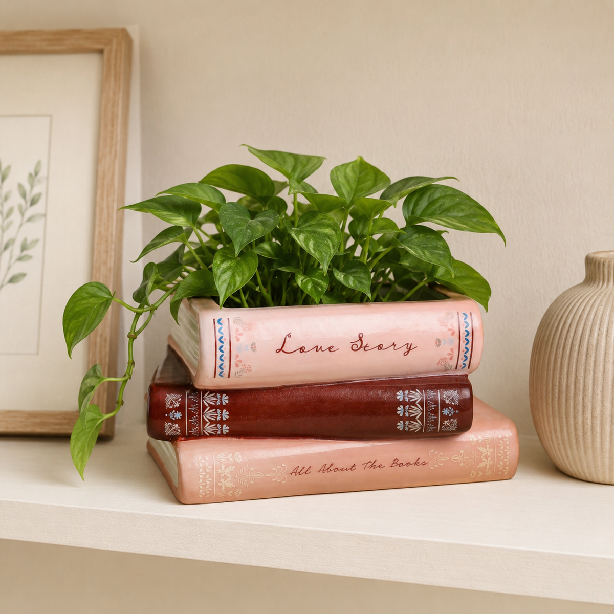 Stack of books with a plant on top on a shelf
