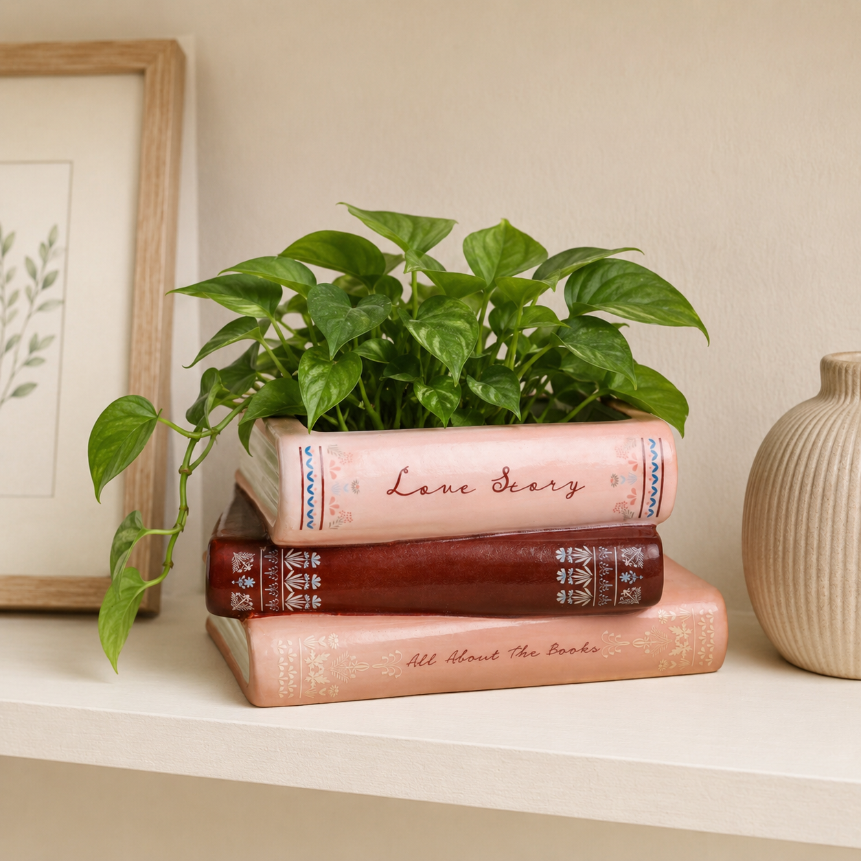 Stack of books with a plant on top on a shelf