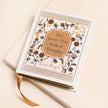 Book titled 'The Teeny-Tiny Book of Thoughts' by Lisa Angel on a beige background