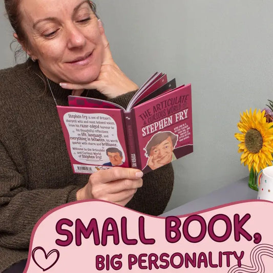 Woman reading a book titled 'The Articulate Curious World of Stephen Fry' with text 'Small Book, Big Personality' at the bottom.