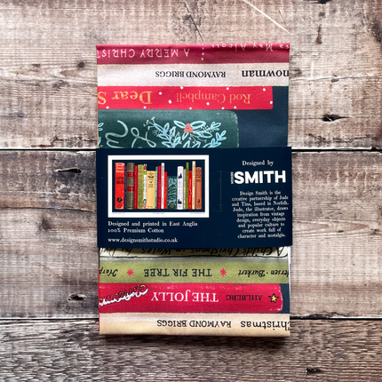 Tea towel with christmas book spines