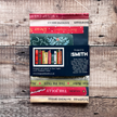 Tea towel with christmas book spines